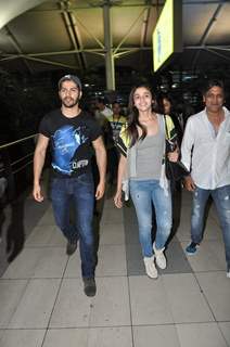 Varun Dhawan and Alia Bhatt poses to media at the Airport