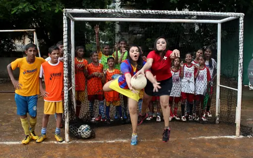 Rakhi Sawant leaps to save a goal
