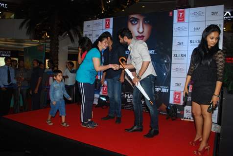 Jay speaks to a fan during the Promotions of Hate Story 2