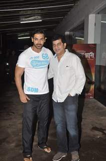 John Abraham with a guest at the Screening of Lai Bhari