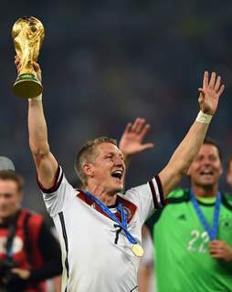 Bastain Schweinsteigerthe with the Trophy at the FIFA Finale