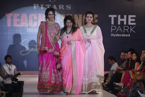 Dia Mirza walk the ramp with model at the Teach for Change 2014 Fashion Show