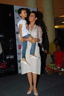 Surveen carries a cute fan at the Hate Story 2 Promotions