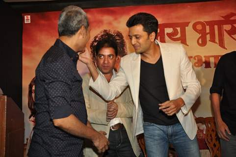 Riteish Deshmukh feeding cake to Nikhil Sane at the Success Bash for Lai Bhari