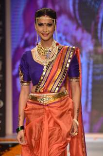 A model walks the ramp as a Maharashtrian bride at the IIJW 2014 - Day 2