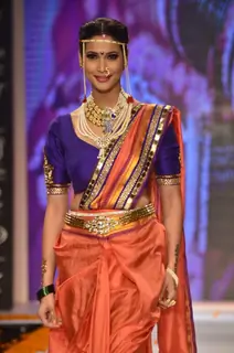 A model walks the ramp as a Maharashtrian bride at the IIJW 2014 - Day 2