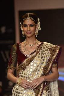 A model walks the ramp as a South India bride at the IIJW 2014 - Day 2