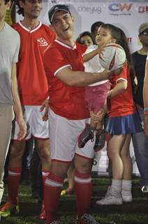 Aamir Khan lifts a kid at Charity Football Match