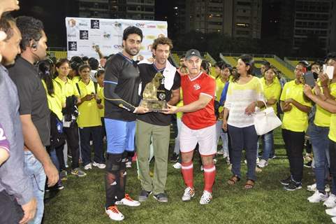 Hrithik, Aamir and Abhishek pose with trophy at football charity event