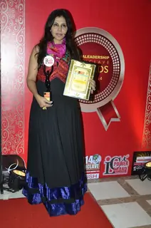 Nisha Jamwal receives the award at the India Leadership Conclave