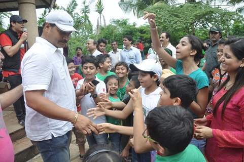 Dayanand Shetty seen greeting his young fans at the Tree Plantation Drive