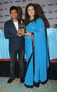 Poonam Dhillon presenting an award at the International Indian Achiever's Award 2014