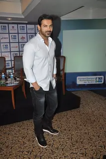 John Abraham poses for the media