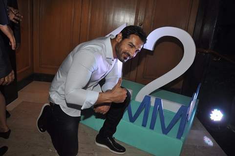 John Abraham poses at Standard Charted Mumbai Marathon 2015 Launch Registration