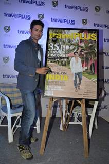 Rajeev Khandelwal poses with the Travel Magazine Poster