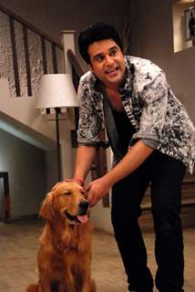 Krushna Abhishek pose with the Dog at the Promotion of It's Entertainment