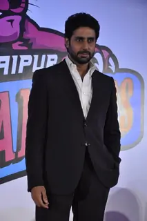 Abhishek Bachchan poses for the media at the announcement of his Kabbadi Team