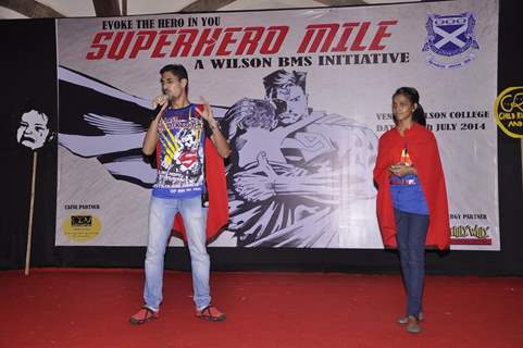 Students perform an enactment at Superhero Mill Event