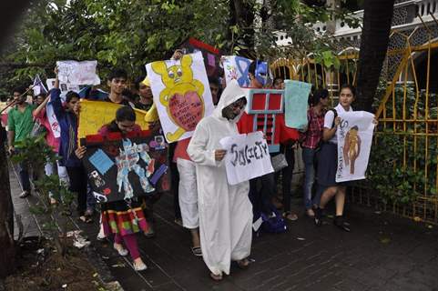 Hundreds Of Student 'Superheroes' Take To The Streets To Fight For Child Rights