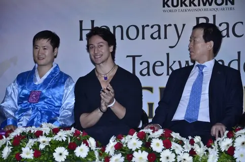 Tiger Shroff gives a smiling pose for the camera