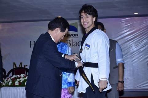 Tiger Shroff receiving his Black Belt at the Kukkiwon Award Ceremony