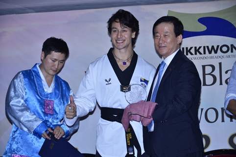 Tiger Shroff being awarded with a Trophy at the Kukkiwon Award Ceremony