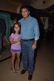 Kamal Saldanah with a child at Roar Film Launch