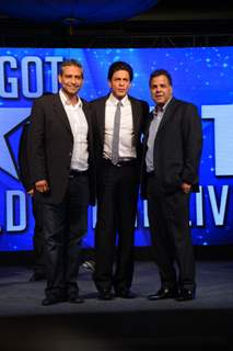 Rav Singh, Shah Rukh Khan and Raj Nayak pose for the media