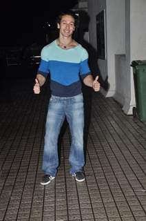 Tiger Shroff gives a thums up pose for the media at PVR