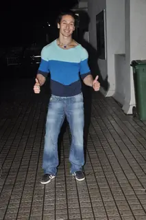 Tiger Shroff gives a thums up pose for the media at PVR
