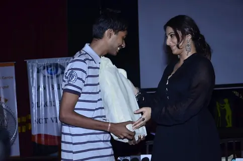 Vidya Balan presents Smartcane Device to a Visually Impaired boy