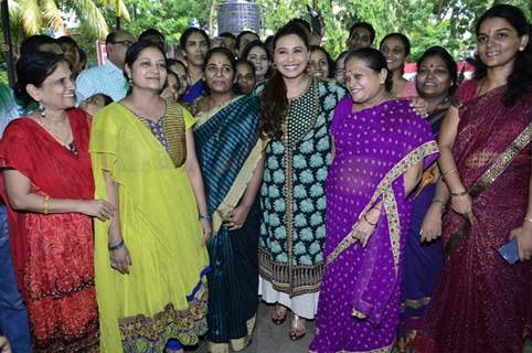 Rani Mukherjee poses with the Teachers at the Promotion of Mardaani at a Local School