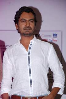 Nawazuddin Siddiqui poses for the media at the DVD Launch of Lunchbox