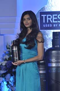 Diana Penty poses for the media with Tresseme products at the endorsement event