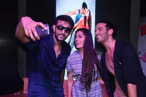 Amrit Maghera and Saahil Prem pose for a selfie with a fan at the Promotion of Mad About Dance