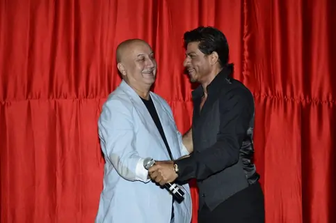 Anupam Kher hugging Shah Rukh Khan at the Trailer Launch of Ekkees Topon Ki Salaami