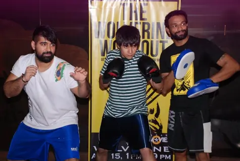 Vivaan Shah practices with friends at the Gold Gym Wolverine Workout