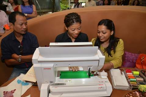 Mary Kom tries her hand on sewing at The Hab promoted by Usha International