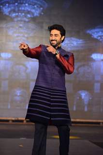 Abhishek Bachchan makes a funky pose while walking the ramp at Manish Malhotra's Show