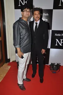Prasoon Joshi and Anil Kapoor pose for the media at the Birthday Bash cum Launch