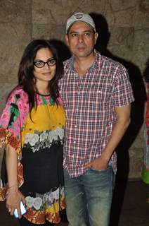 Atul Agnihotri with Alvira Khan was seen at the Screening of Singham Returns