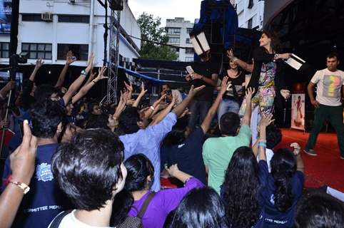 Sonam Kapoor throws some goodies to her fans at the Promotions of Khoobsurat at Mithibai College