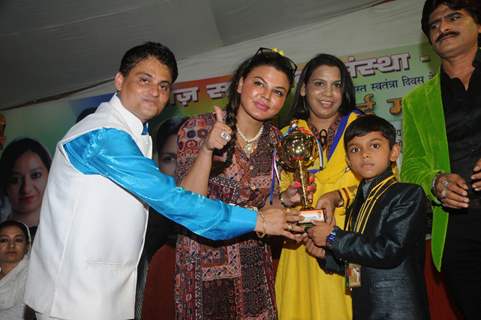 Rakhi Sawant felicitates a young achiever at the event