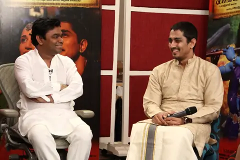A.R. Rahman and Siddharth share a laugh at the Music Launch of Kaaviya Thalaivan