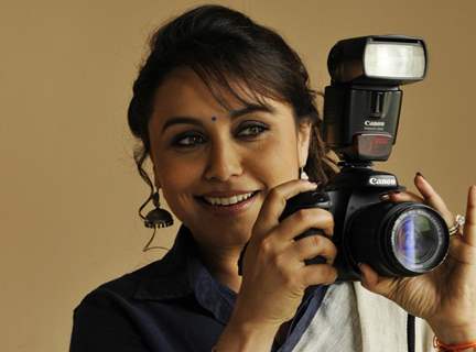 Rani Mukherjee poses with a Camera on World Photography Day