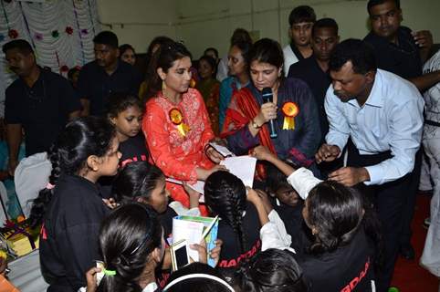 Rani Mukherjee signs autograph for her young fans