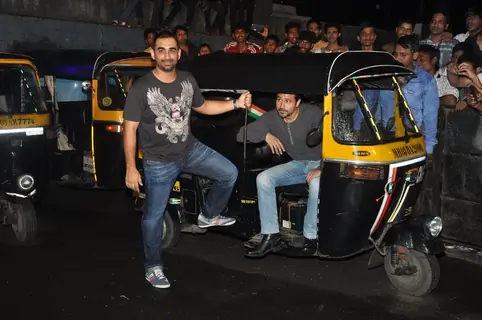 Emraan Hashmi and Kunal Deshmukh pose with the Auto Rickshaw