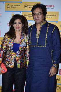 Talat and Bina Aziz pose for the media at Shaan's Live Concert