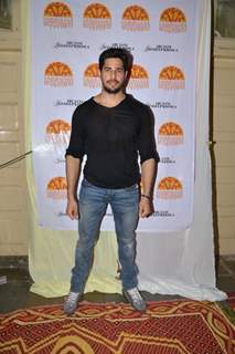 Sidharth Malhotra poses for the media at Ashray Ngo