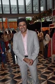 Sameer Soni poses for the camera at Araish Charity Exhibition